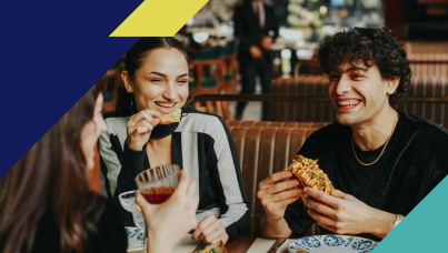 Photo showing people happily eating at a restaurant