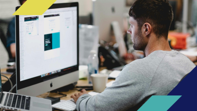 image of person using a computer at work