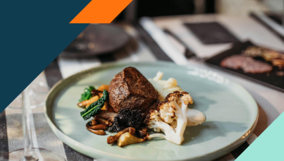 Image of a plate with steak and vegetables