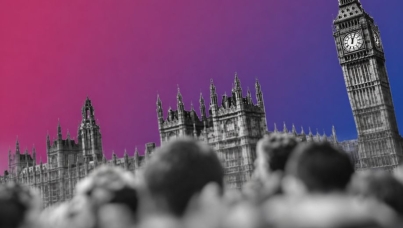 Black-and-white photograph-style view of a blurred crowd in front of the Palace of Westminster