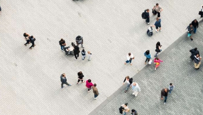 group of people walking on a street