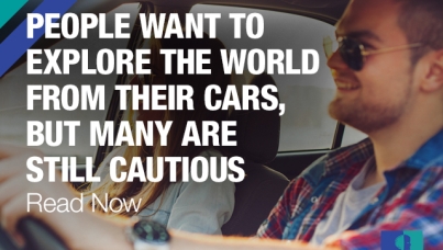 people in car on road trip