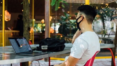 masked up person working
