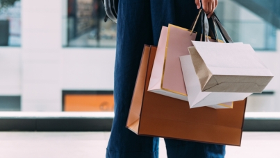 A lady with shopping bags