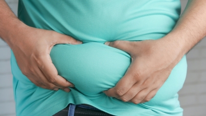 a person holding their paunch
