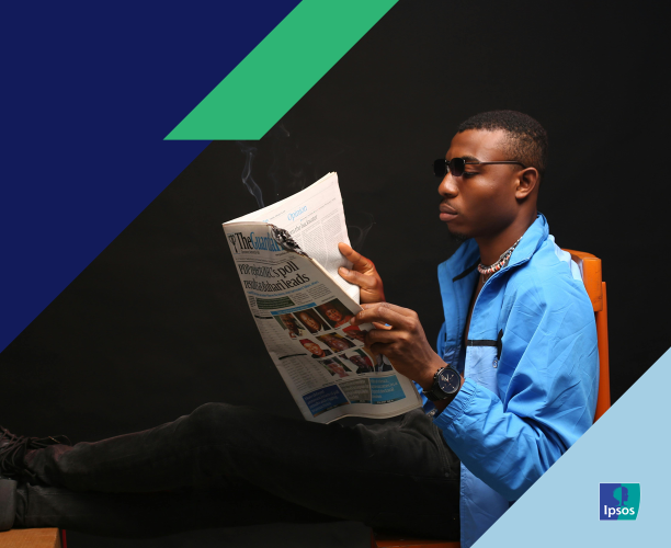 Image of a man reading a newspaper