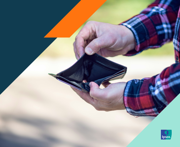 Picture of a man holding an empty wallet