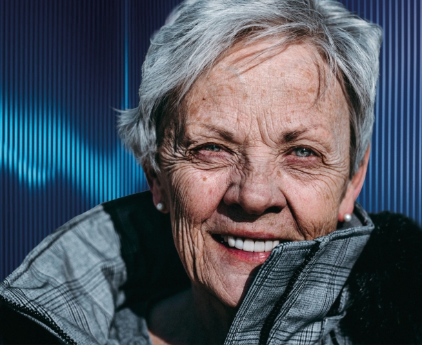 A photo of a woman on a dark blue background