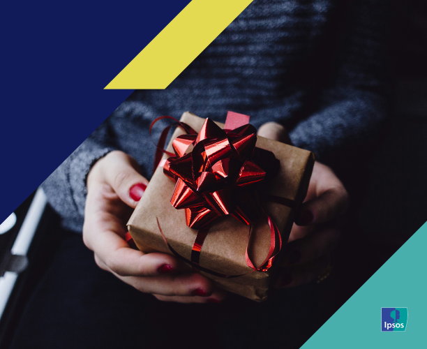 Image of hands holding a small present