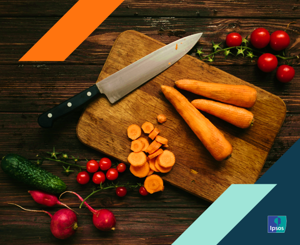 Image of vegetables on cutting board along with a knife