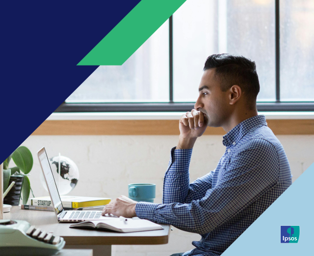 Picture of a man thinking while looking at a computer