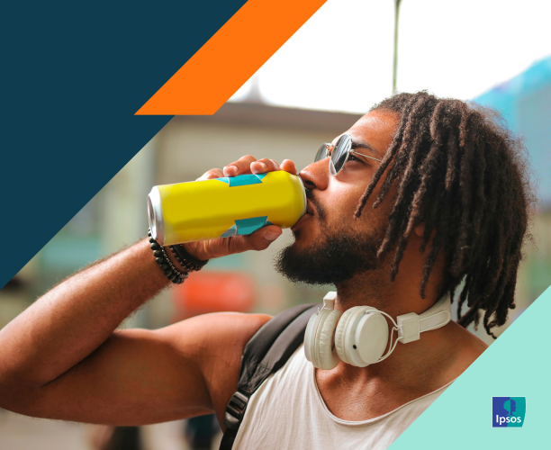 Photograph of man drinking from a brightly colored can