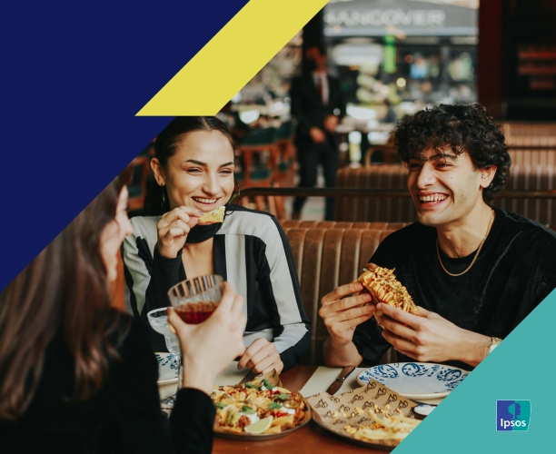 Photo showing people happily eating at a restaurant