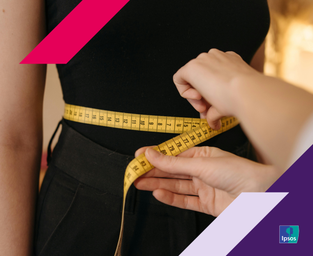 Image of a body being measured with a tape measure