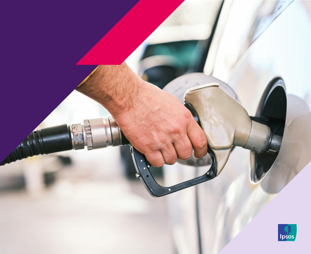image of hand pumping gas