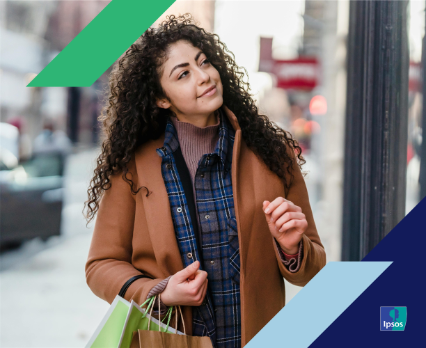 Photo of woman holding shopping bags