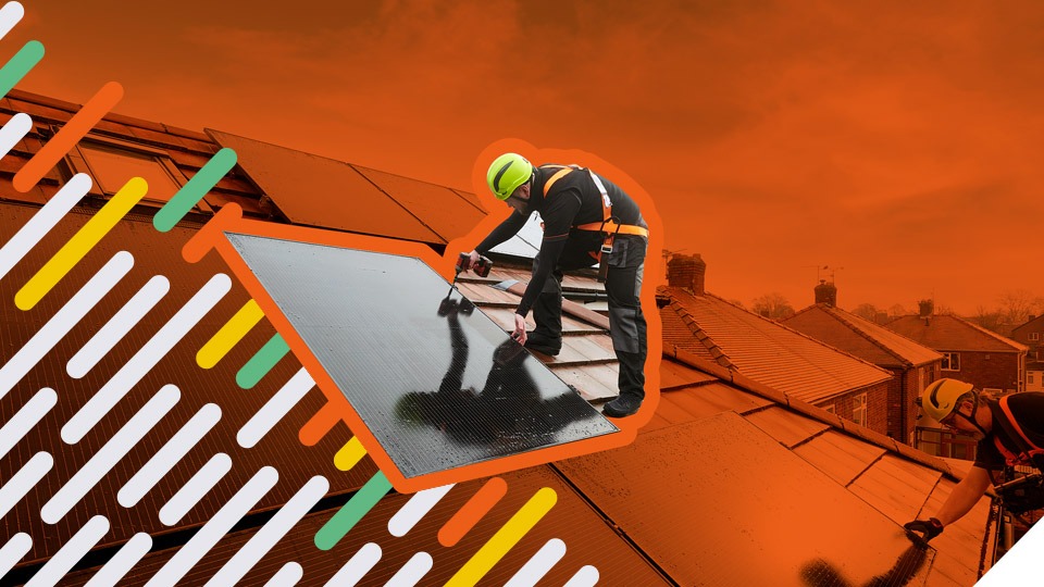 engineer installing solar panels on roof