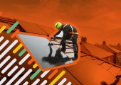 engineer installing solar panels on roof